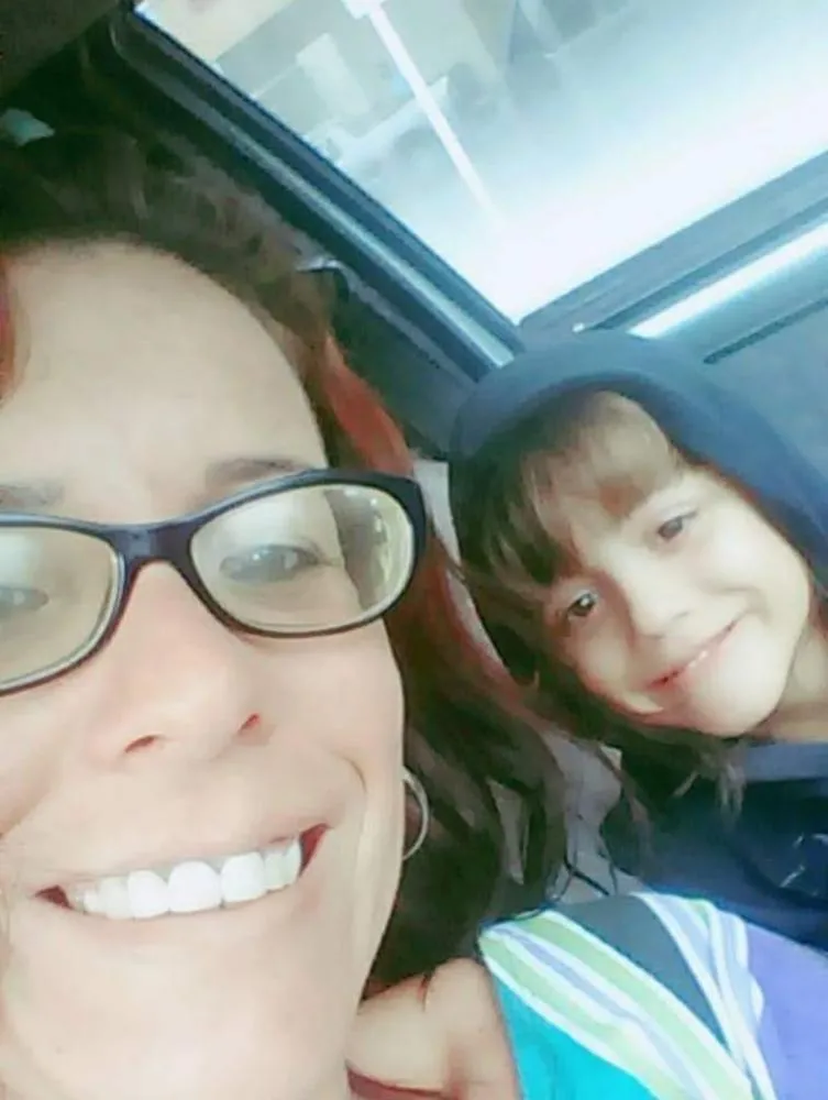 Cristina e uma de suas filhas - Foto: Arquivo Pessoal